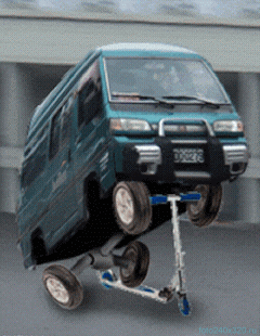 Delica on a scooter.gif
